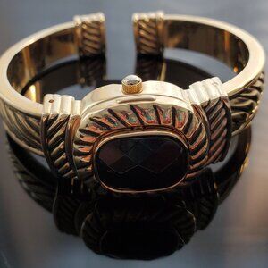 Peck & Peck Gold tone watch bracelet with black stone